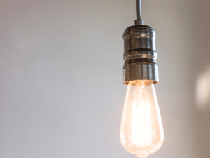 Lightbulb. Offset your home emissions with Carbon Positive Australia.