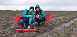 happy people planting in the Great Southern