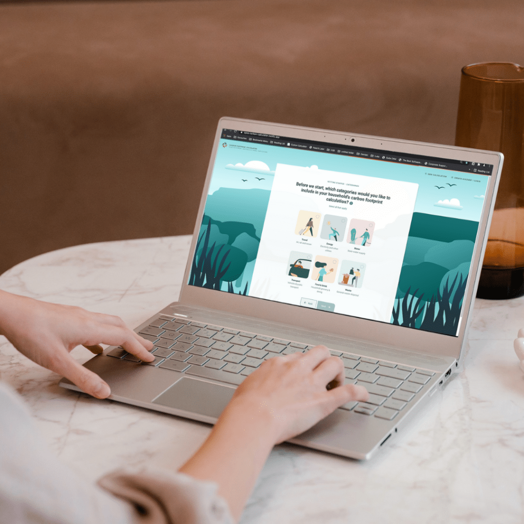 Business using Carbon Positive Australia Carbon Footprint Calculator on a computer