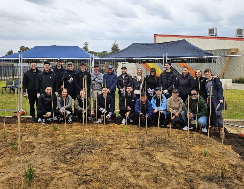 Business Partners helping with native tree planting projects