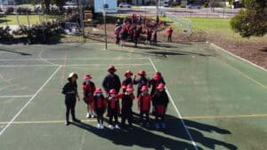 Drone shot of kids on a basketball court