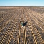 drone shots of planting tractor in planting rows